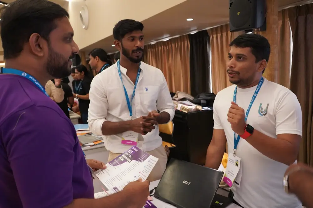 Ucartz team members with visitors at WordCamp Kerala in Kochi